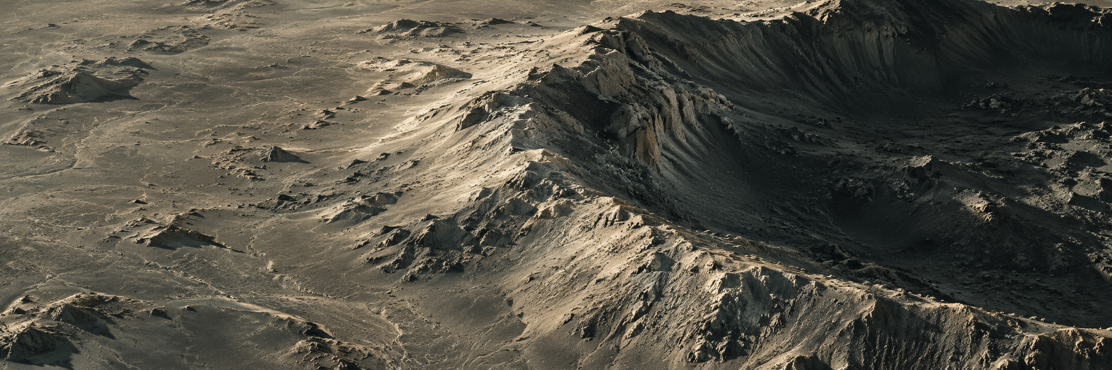 Impact crater terrain in low-angle light